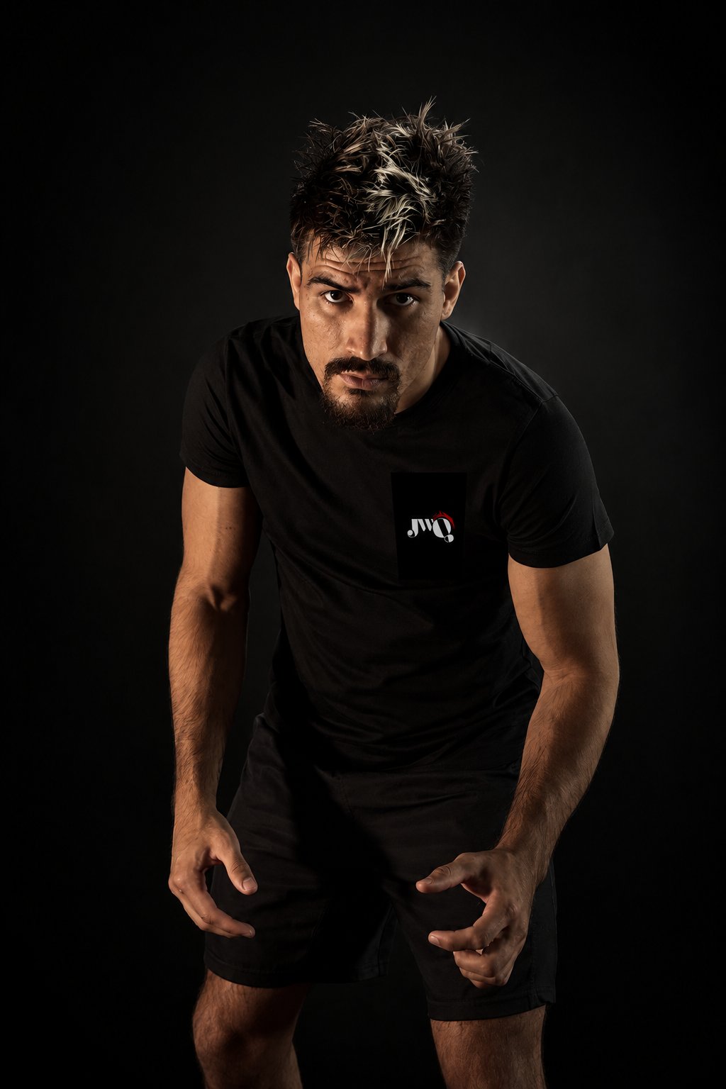 Character tee — front, JWQ emblem